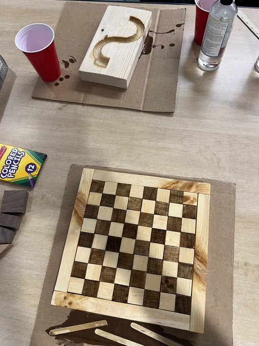 First iteration of the chess board as a proof of concept for the larger project. Made from cheap pine.