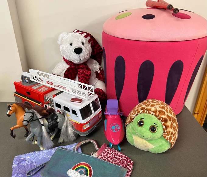 Various children's toys set atop a table