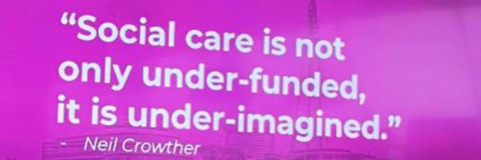Sign saying 'social care is not only under-resourced, it's under-imagined'