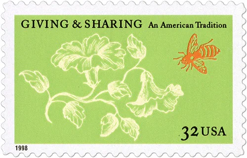 U.S. postage stamp with green background, white flowers, and an orange bee. Text says "Giving & Sharing: An American Tradition"