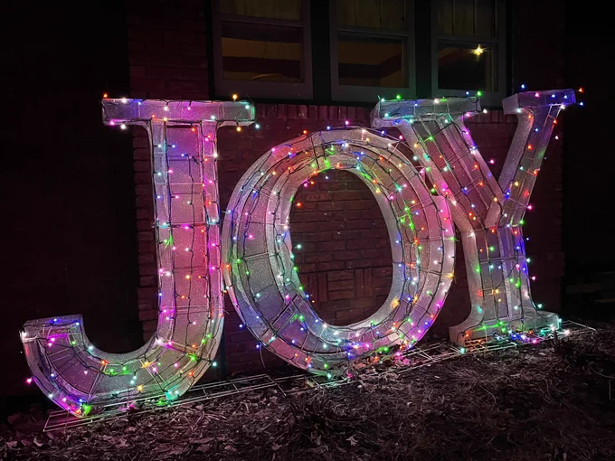 This is an outdoor 6 foot JOY holiday decoration with multi colored lights.