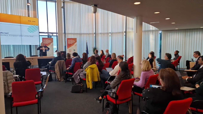 A picture of the room with participants