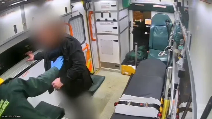 A screenshot from CCTV footage showing an abusive patient assaulting our paramedic. 