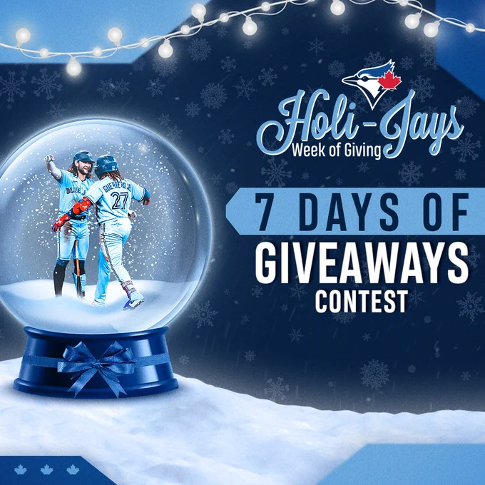 A graphic that reads "Holi-Jays Week of Giving" and "7 Days of Giveaways Contest" 

Inside a snow globe, Bo Bichette and Vladimir Guerrero Jr. embrace.