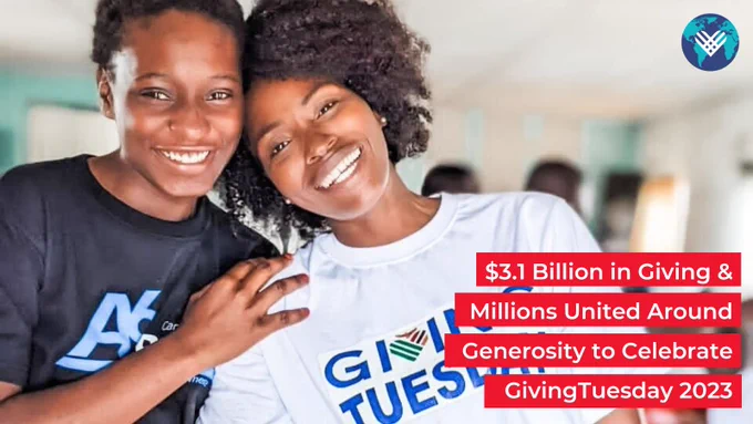 Two people  from Zambia embrace during a GivingTuesday event on November 28 2023. One person is wearing a white shirt with a GivingTuesdayZambia logo on it. The text reads: $3.1 Billion in Giving & Millions United Around Generosity to Celebrate GivingTuesday 2023
