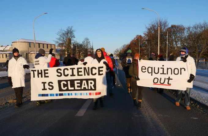 Demonstrators marching in the streets in Trondheim, carrying banners saying "The science is clear" and "Equinor out". Photo: Denis Zimarev.