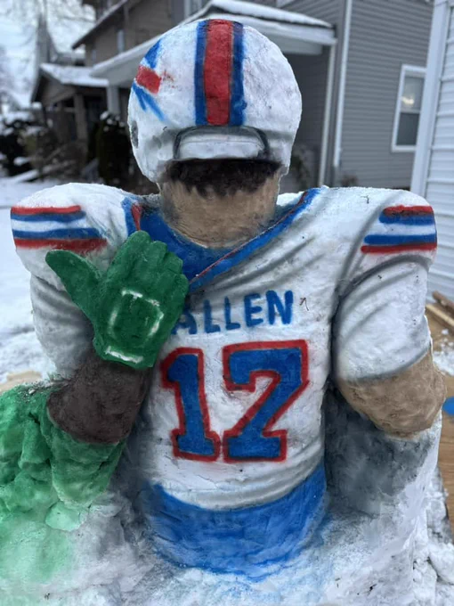 Snow sculpture created by artist Eric Jones depicts Bills quarterback Josh Allen being horse-collar tackled during Sunday's loss to the Eagles. 