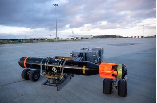 Sting Ray torpedo outside on a runway.