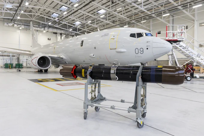 Another shot of Sting Ray torpedo with P-8 Poseidon in the background.