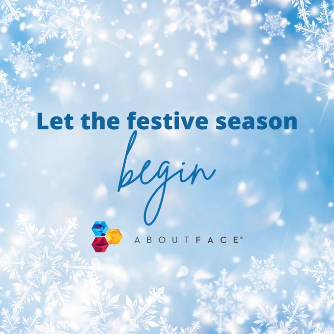 blue background with snowflakes and dark blue text that reads "let the festive season begin" with the AboutFace logo below. 