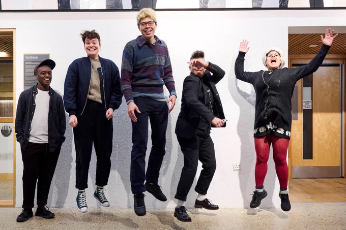 Four poets in residence, plus the Visiting Poetry Fellow: jumping in the air. From left Jay Bernard, Gail McConnell, Will Harris, Joelle Taylor and Anthony Vahni Capildeo