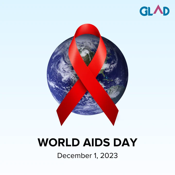 Red AIDS ribbon over the earth. Below, text says: World AIDS Day. December 1, 2023.