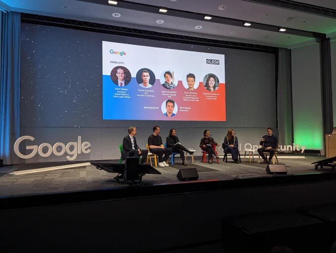 Panelists on stage at Slush 2023; sign in background reads: Kent Walker, President Global Affairs & Chief Legal Officer; Victor Riparbelli, CEO, founder of Synthesia; Ilona Lundstrom, Director General, TEM; Karen Melchior, Member of the European Parliament, Renew Europe Group; Ekaterina Almasque, General Partner at OpenOcean; Moderator: Mark Bergen, Bloomberg
