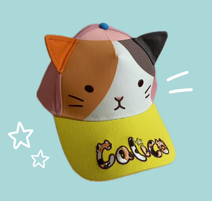 A colorful cap with cat ears, face, and Calico logo