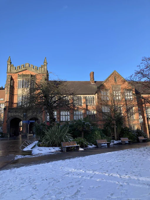 Newcastle University with snow in the foreground.