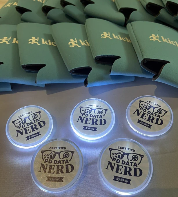 KickUp swag - light blue koozies and pd data nerd light up pins