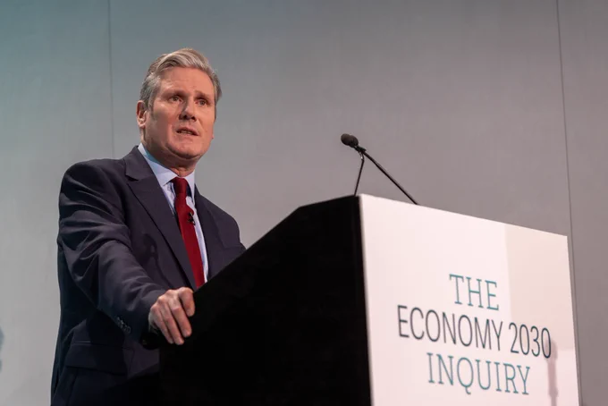 Keir Starmer is pictured giving a speech