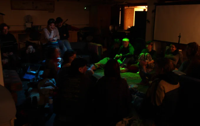 Co-op members gathered around for Candlelight Ceilidh. 