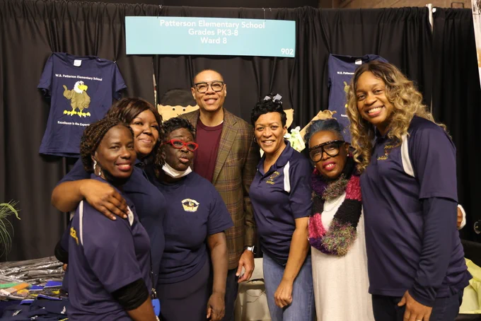 Chancellor Ferebee poses with staff members from Patterson Elementary School.