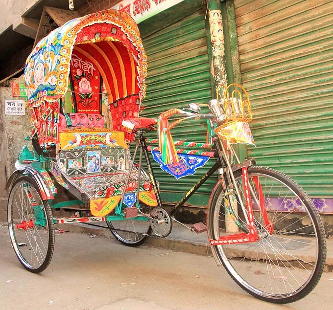 © Shahabul Alam Sajib, Bangladesh, 2022
EN: The foreground of Rickshaw with colourful Rickshaw art