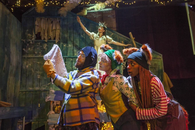 A wonderful Christmas scene of a mole and 2 foxes (mark, Miriam and Jade) reading a letter. With the white Snow Fairy queen dancing behind.