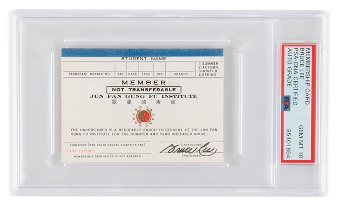 Unissued 'blue stripe' student membership card for Bruce Lee's Jun Fan Gung Fu Institute of Seattle, Washington. Bruce Lee signs the card in black ink on the bottom right-hand corner above the 'President' line. These cards contained information about the institute members including their sex, rank, and year.