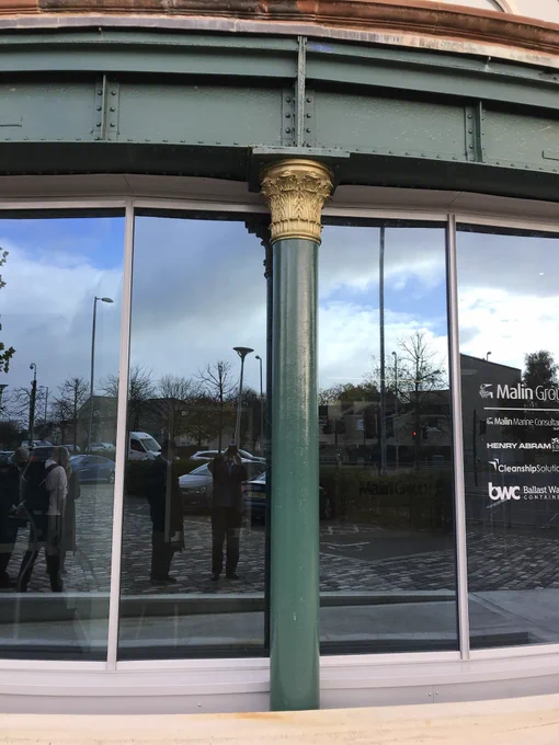 This green and gilt painted cast iron Corinthian column holds up a huge steel beam over what was the vehicular entrance to the South Rotunda at 100 Govan Road, Glasgow. With a bit of Glasgow City Heritage Trust funding, the South Rotunda was saved from dereliction and brought back into use as the headquarters for Malin Group but originally built between 1890-5 over the entrance to the 3 tunnels under the Clyde. The red brick rotunda is a well known landmark on the Clyde.