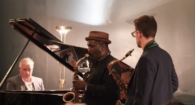 James Pearson on piano, Tony Kofi and Tim Boniface playing the saxophone at the Jazz from the Heart concert for Black History Month.
Photo credit: Reva Croft