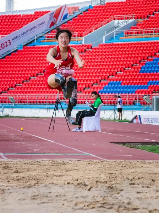 Athlete with leg amputation competing in long jump