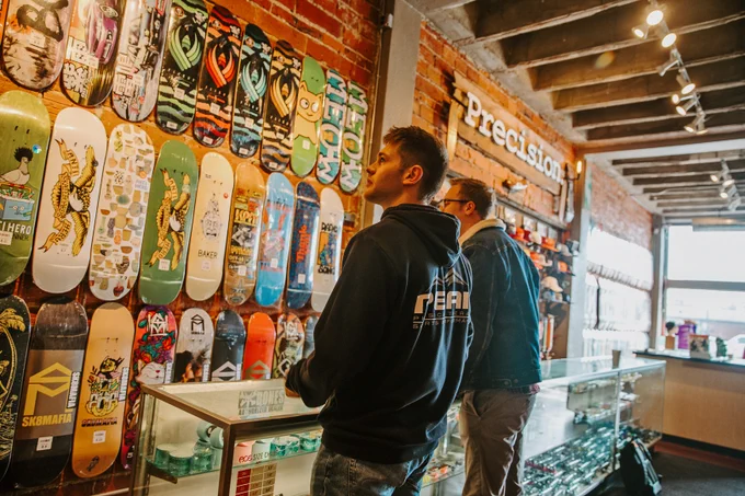 Students shop at Precision — a skateboard shop in downtown Lincoln