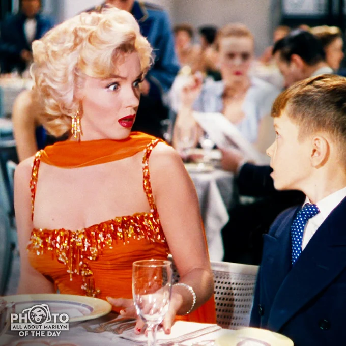 Marilyn Monroe and George Winslow in the dinner scene from Gentlemen Prefer Blondes