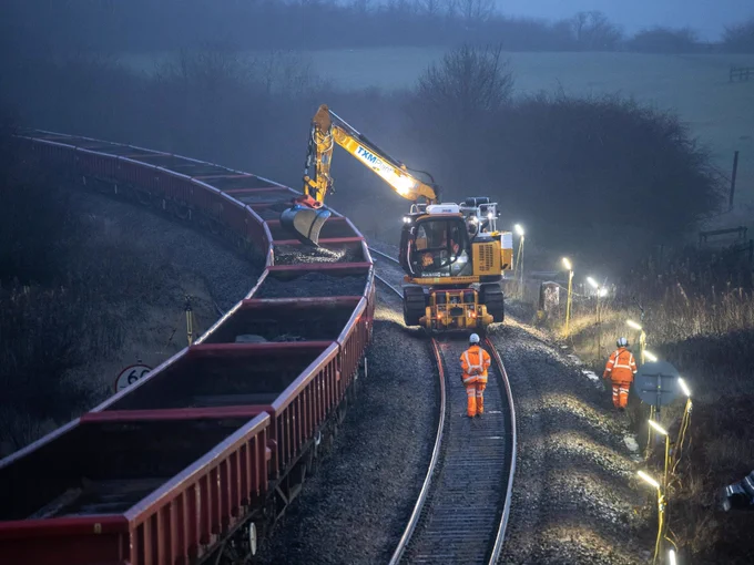 Engineers working in the evening at Morley station.