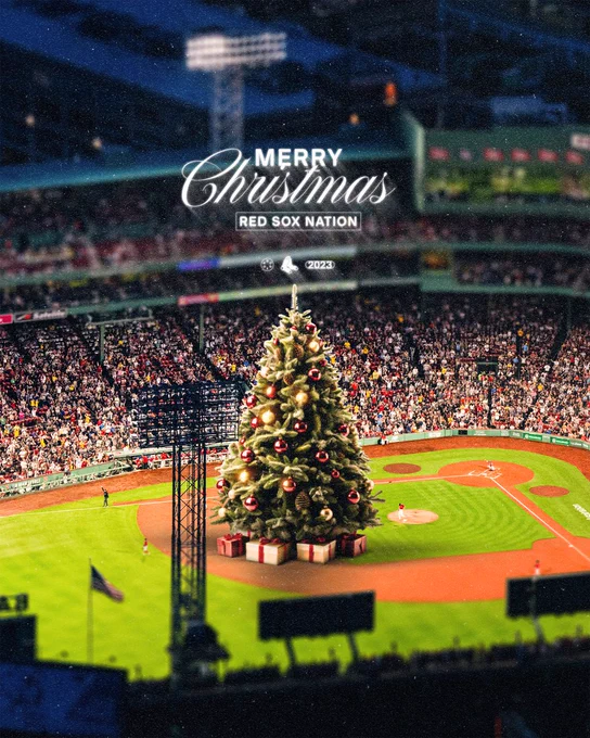 Text: Merry Christmas, Red Sox Nation.
Pictured: an aerial view of Fenway Park looking in at the park from center field. A Christmas tree with presents underneath it is in the middle of the field. 
