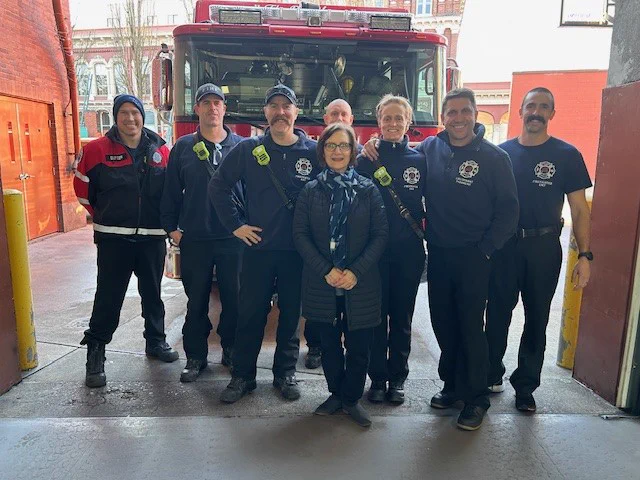 Congresswoman Bonamici stands with a group of firefighters from Portland Fire and Rescue's Station 1.