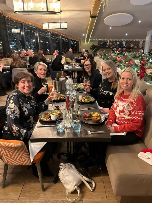 Group photo of 5 ladies with our dinner