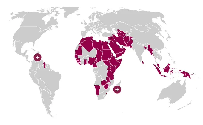 World map with most countries in grey, and those which criminalise LGBT  people in red.