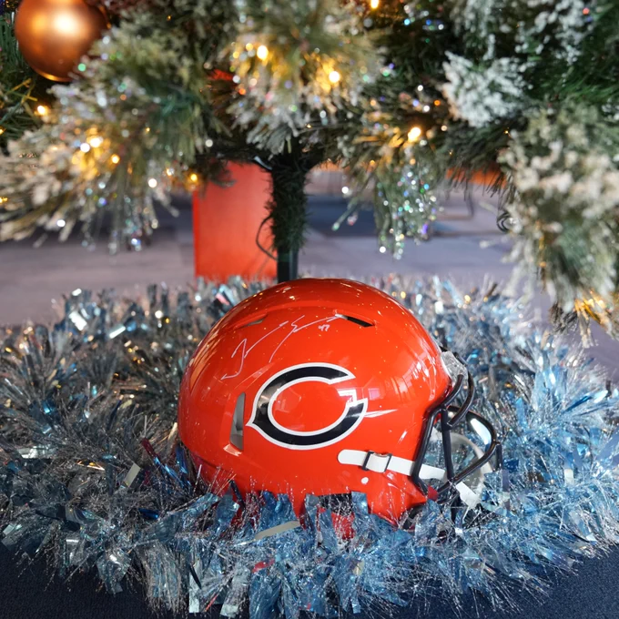 Tremaine Edmunds signed orange helmet sitting under Christmas tree