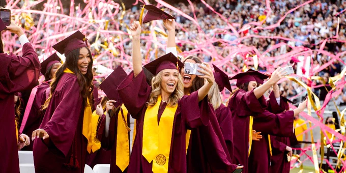 Students celebrating during ASU commencement ceremony