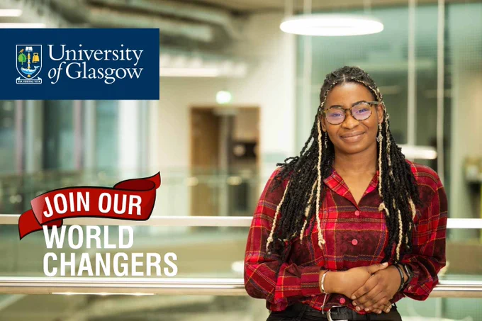 JMS Scholar Rachel Isaiah wearing a red checked shirt, leaning on a railing. Banner text reads 'Join our World Changers'.