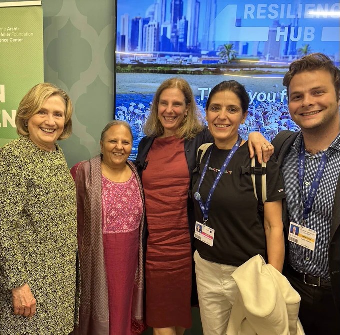Jacob with people including Hillary Clinton