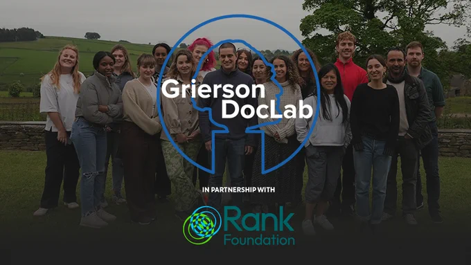 Group shot of Grierson DocLab trainees in the background with blue Grierson DocLab logo on top. Below says 'in partnership with' Rank Foundation logo. 