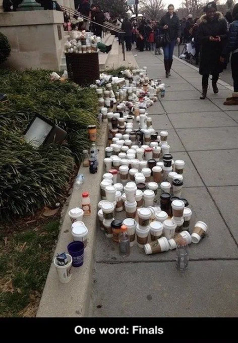 Image of trash overflowing with coffee cups