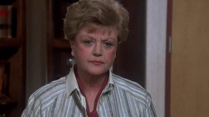 murder she wrote protagonist jessica fletcher, played by angela lansbury, looking into the distance with a disappointed expression 