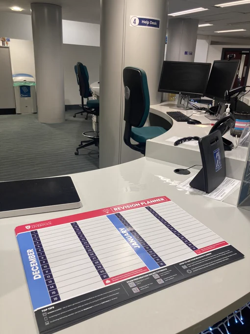 Image of KnowHow revision planners at the Help Desk in the Harold Cohen Library