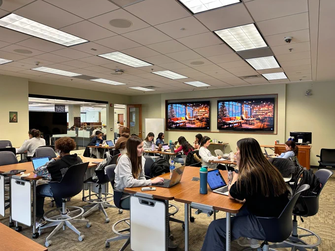 students at the unc undergraduate library studying with lo-fi music on the screen