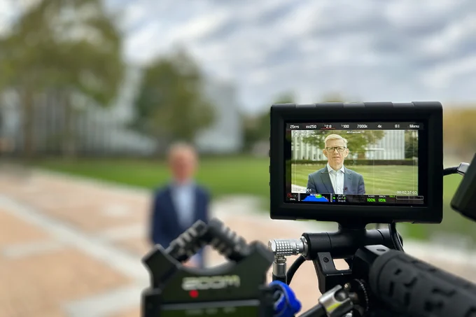 Helen and Henry Posner, Jr. Dean of the University Libraries Keith Webster during filming.
