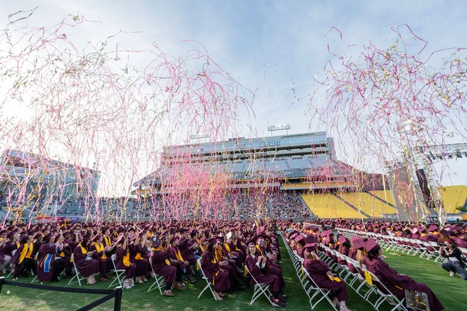 Confetti streamers rain down on the 2023 graduating class during ASU’s undergraduate commencement.