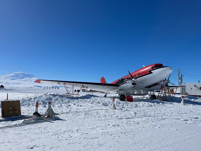 A heavily modified DC-3, known as a Basler MKB, waits on the ice before test flights at the Williams Field, Antarctica.