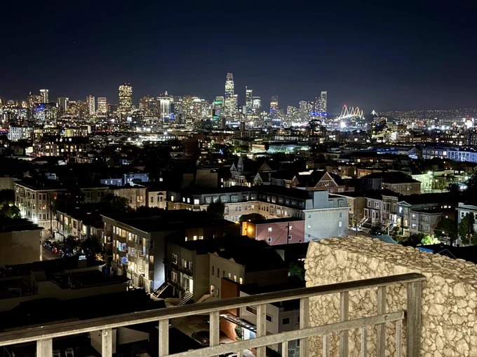 The view from the 9th floor of the US Bank building in San Francisco. You can see above the roofs of the Mission and the Bay Bridge in the background. 