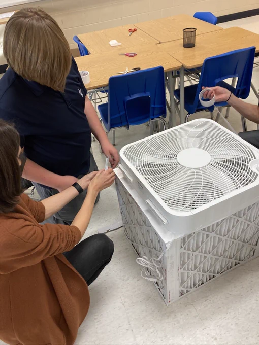Photograph of our attempt to duct tape the box fan on top of the filters
